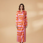 Women's dress with long sleeves and a striped surface