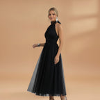 Women's maxi dress with a halter neck and tulle surface