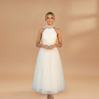 Women's maxi dress with a halter neck and tulle surface