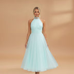 Women's maxi dress with a halter neck and tulle surface