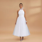 Women's maxi dress with a halter neck and tulle surface