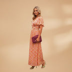 Women's maxi dress with wrap closure and floral print